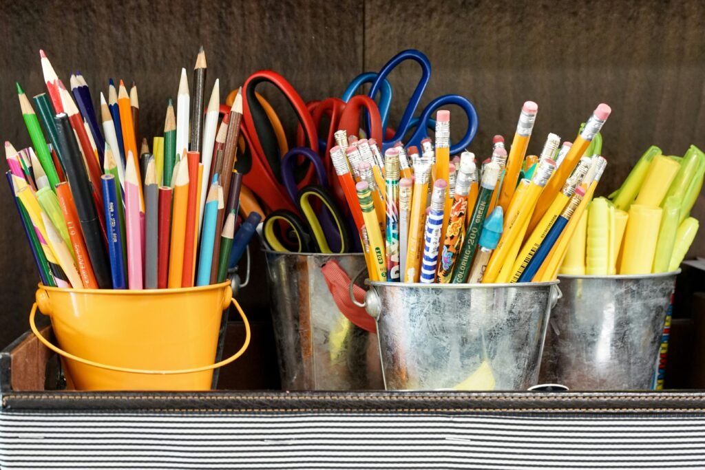 assorted color pencils in yellow bucket assorted color pencils in yellow bucket