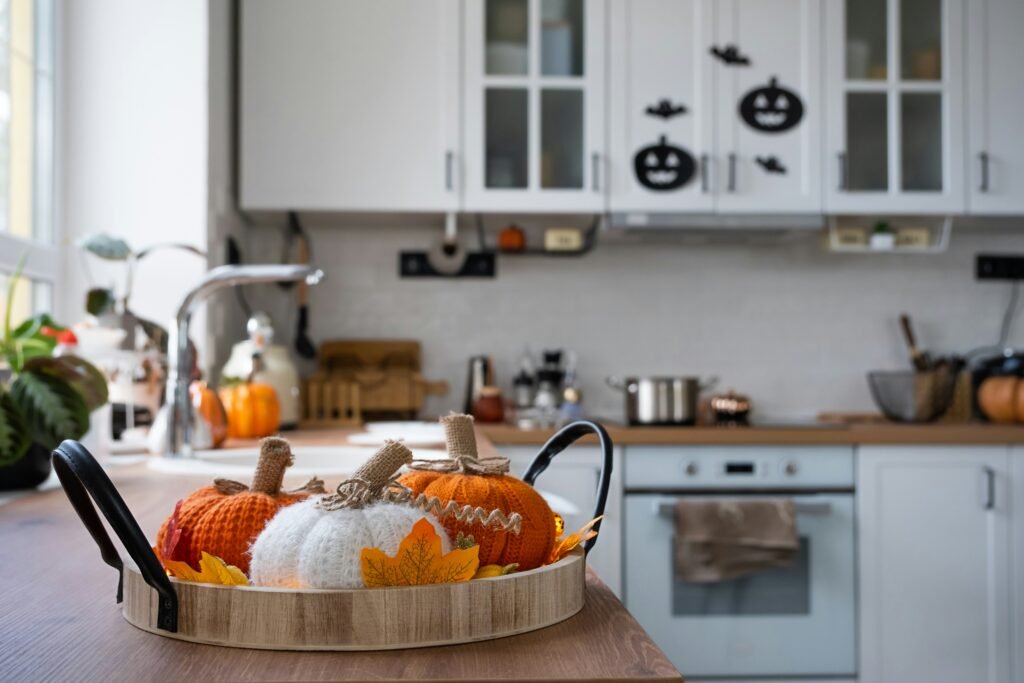 a kitchen with a basket of pumpkins a kitchen with a basket of pumpkins